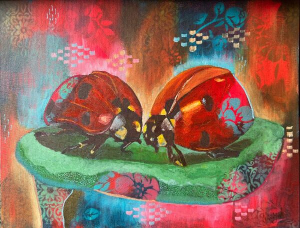 Ladybirds on a leaf