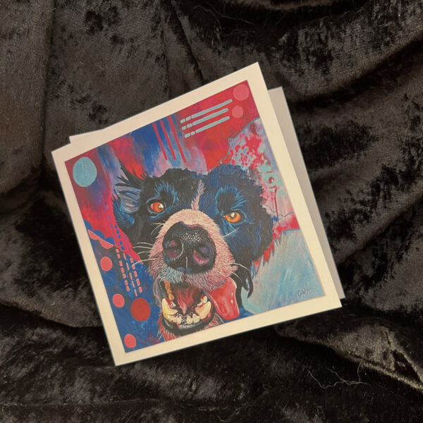 a square card with a dog's face on it