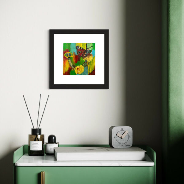 Framed, small art by the dresser